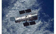 The Hubble Space Telescope with Earth in the background