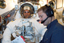 Astronaut Michael T. Good participates in spacesuit fit check at NASA's Johnson Space