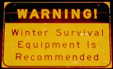 Sign that Reads: Warning! Winter Survival Equipment is Recommended