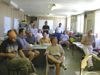 Crowd watching the daily weather briefing