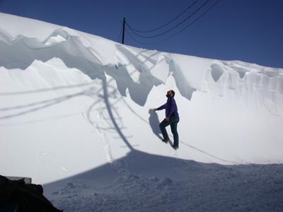 Eric climbing snow drift from storm