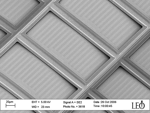 A SEM image of the microshutters array with the light shields that prevent light passing through the gaps between shutter blades and the frame. Wide light shields are a special requirement from NG-FORTIS mission.